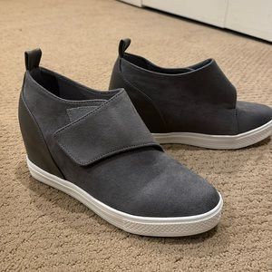 Dark gray elevated heel sneaker